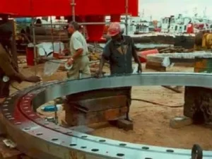 bearing connecting the turret and the sleeve